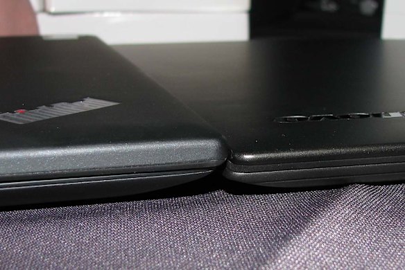 Lenovo's new ThinkPad X1 Carbon alongside its predecessor.