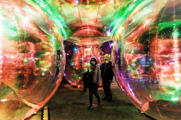 Covid-safe attendees explore the Ephemeral Oceanic at Walsh Bay as Vivid lights up for 2022 