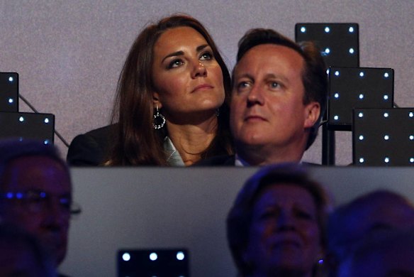 Catherine, Duchess of Cambridge, and Britain's prime minister David Cameron watch the opening ceremony of the London 2012 Olympic Games.  Photo by Reuters