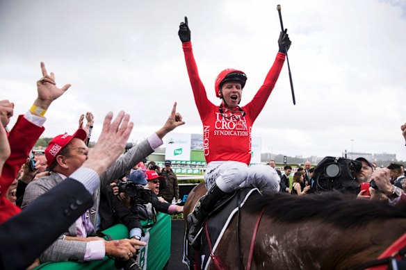 Jockey Kerrin McEvoy smiles after riding Redzel to win the TAB Everest horse race.