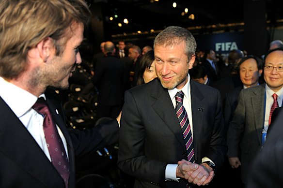 England 2018 Ambassador David Beckham congratulates Roman Abramovich of the winning Russia bid.