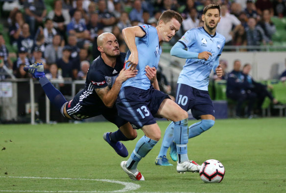 Hard to stop: Sydney FC's Brandon O'Neill holds off James Troisi.