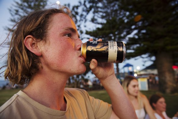 Schoolie Ethan Long from Kincumber High School in the park at Main Beach.