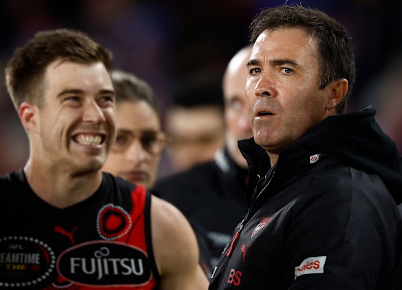 Testing times: Essendon coach Brad Scott and skipper Zach Merrett.