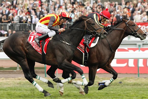 Yasunari Iwata on Delta Blues hold off Damien Oliver on Pop Rock to win the 2006 Melbourne Cup.
