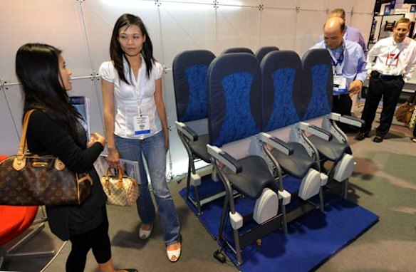 Aviation journalists try out the Italian company Aviointeriors S.P.A, new 'Skyrider' seat.
