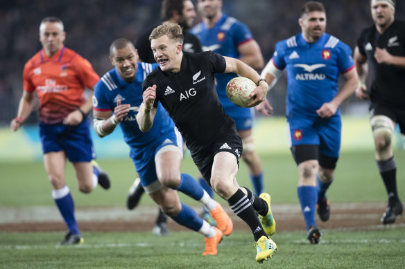 Stand-off stands up: Fly-half  Damian McKenzie makes a break against France.