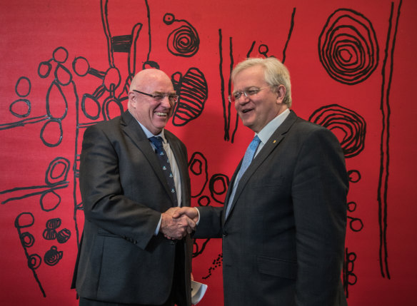 Canberra lawyer Craig Edwards with ANU vice-chancellor Brian Schmidt in front of one of the works Mr Edwards has just donated to the university. 