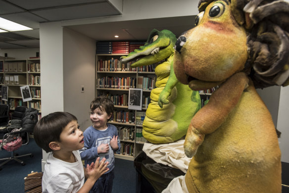 William Lowry and Hugo French get up close with Calvin the Crocodile and Leo the Lion.