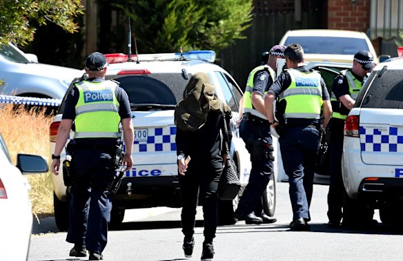 Police are conducting a raid at a home in Meadow Heights in relation to the Christmas terror plot in Meadow Heights. A woman spoke to police at the scene.