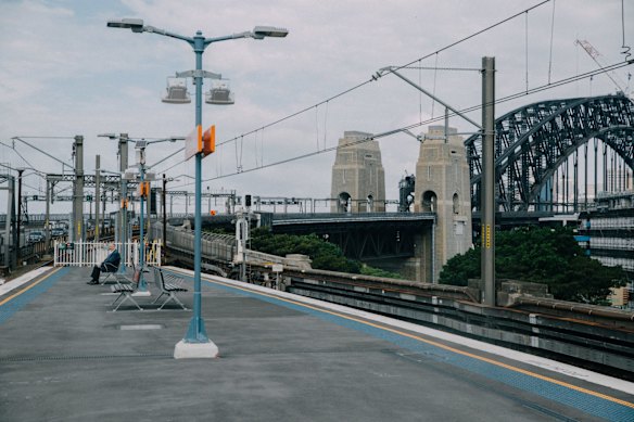Milsons Point railway station, Sydney. March 25, 2020.

“The first time I got off at Milsons Point station, it was by mistake. I skipped the next train to absorb the remarkable scenery. I watched this man walk to the furthest seat on the platform. There was plenty of seating closer to the main stairwell and only three other people were on the platform, a guard, another commuter and me. I can’t blame him for wanting to keep his distance.” 

– Roger Stonehouse, photographer for The Sydney Morning Herald since 2015.
