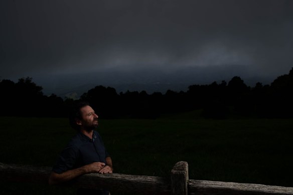 Mark Graham, an ecologist with Bellingen Nature Tours, at Griffiths Lookout on the Dorrigo Plateau, which shows the edge of the proposed Great Koala National Park in the distance. 