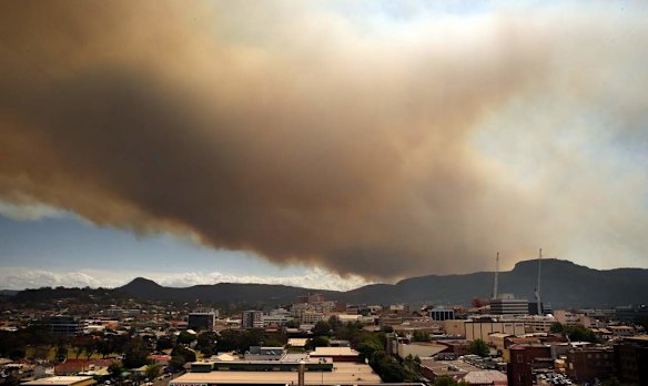 Bushfire smoke can be seen over the top of Wollongong City from Level 10 at the Wollongong City Council building.