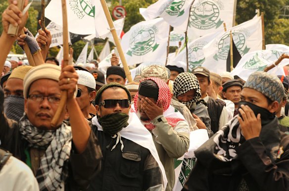 Hundreds of protestors gathered for anti US protests at the Bunderan Hotel Indonesia traffic circle in Central Jakarta, Indonesia.