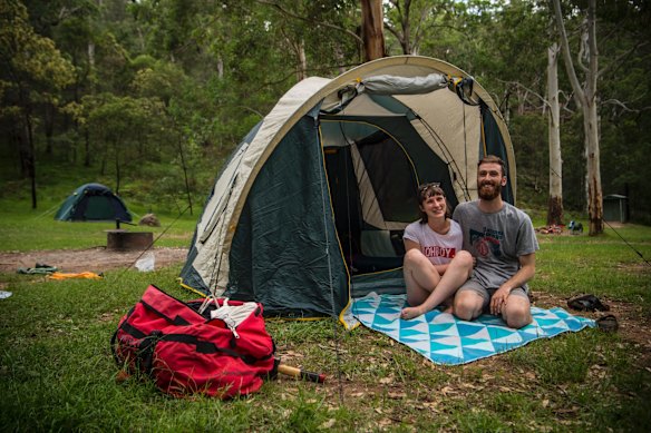 Tom Durand and Brigette Armstrong from Marrickville set up their campsite at Euroka Clearing in Glenbrook National Park. They're ringing in the new year whilst on a two day hike in the park. 