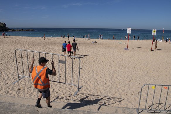 Barricades are placed at Coogee beach, the beach reopened for exercise only. Bondi beach is set to reopen under the same guidelines next Tuesday.