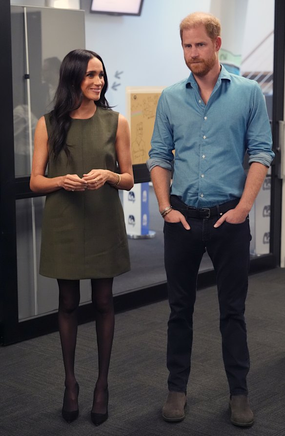 Meghan wearing the Anya shift dress from Friends With Frank alongside Prince Harry at Swinburne University of Technology in April.