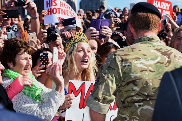 Britain's Prince Harry is greeted with a proposal.
