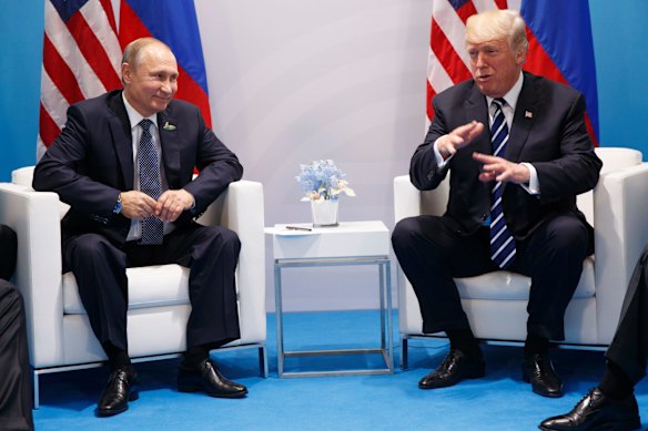 President Donald Trump speaks during a meeting with Russian President Vladimir Putin at the G20 Summit at the G20 Summit.