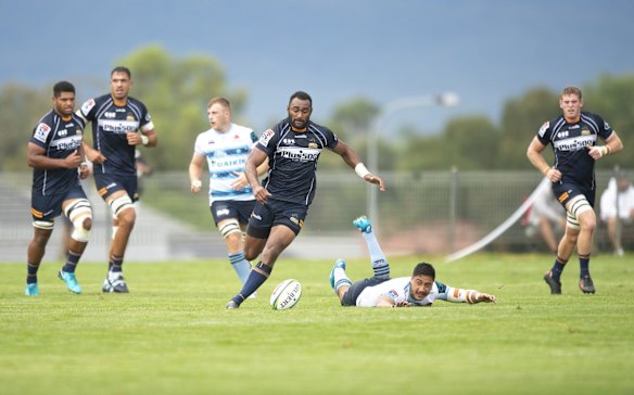 The Brumbies' Tevita Kuridrani chases after a loose ball. 