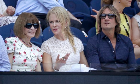 Nicole Kidman sits with her husband Keith Urban as she chats with Anna Wintour before the semi-final between Petra Kvitova and Danielle Collins at the Australian Open.