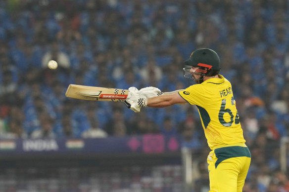Batter up: Travis Head has joined a select group of men to score centuries in an ODI World Cup final.