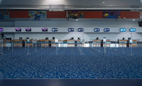 The shuttered and locked Cairns International Terminal at Cairns Airport.