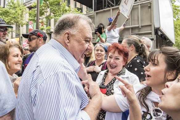 Craig Kelly arrives to address the crowd of the World Wide Rally for Freedom March, in Sydney, against vaccine mandates and various other COVID related health orders.