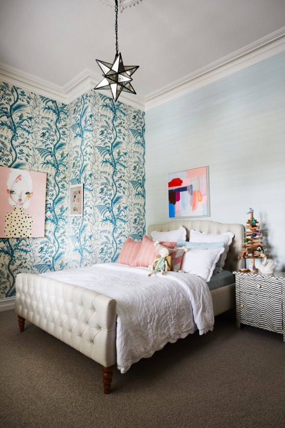 Bedroom perfection in Charlie’s room, with Brunschwig &amp; Fils wallpaper and art by Sara Winfield (left), Rachel Castle and Arite Kannavos (above bed).