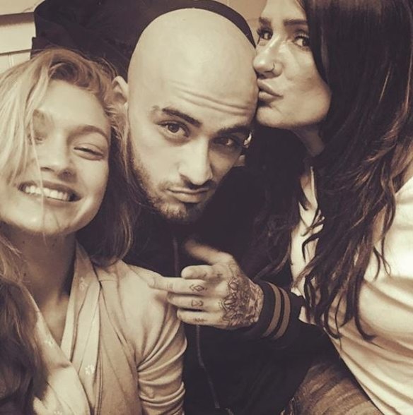 Posing with his girlfriend, model Gigi Hadid and his mother Trisha for an Instagram photo on her account, 24-year-old Zayn Malik has now done away with all his hair, rocking a completely smooth scalp. As they have responded to many decisions made by the former boyband member, fans on social media are divided about his new look. Either way... at least hair grows back.