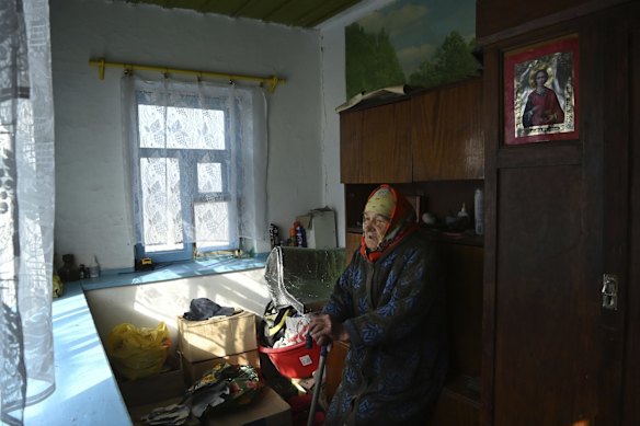 Rayisa, 84, at home in Novooleksandrivka village in the Kherson Oblast. The windows of her family home shattered from the impact of a Grad missile hitting the street on October 14. 
