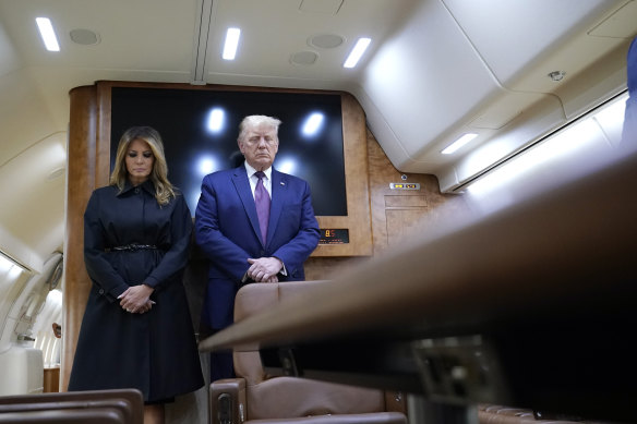 President Donald Trump and first lady Melania Trump pause for a moment of silence on Air Force One on his way to speak at the Flight 93 National Memorial in Shanksville Pennsylvania.