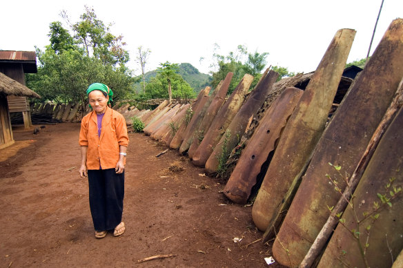 A fence made from US cluster-bomb casings.