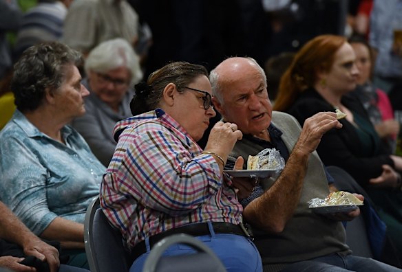 Members of the public getting some quick lunch in while they listen to candidates at a public gathering 
at the Scone RSL.