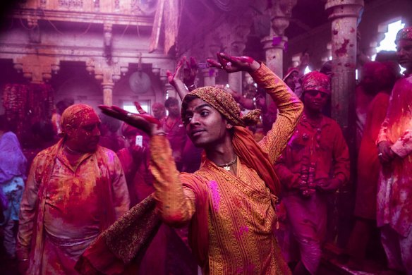 Hindu devotees play with colour in the village of Barsana, India.