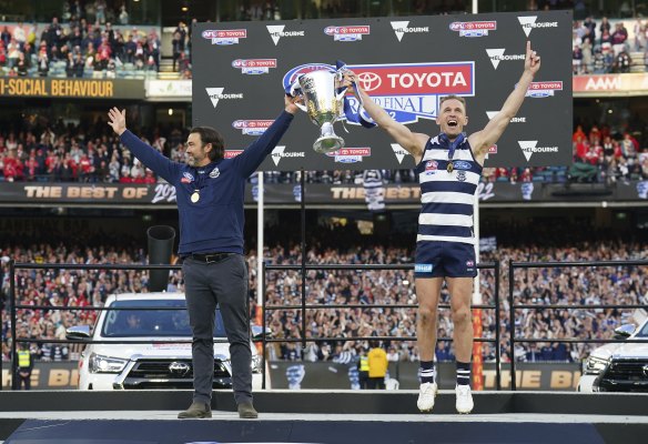 Time to celebrate: But is the AFL grand final best finishing in the late afternoon or in the evening?