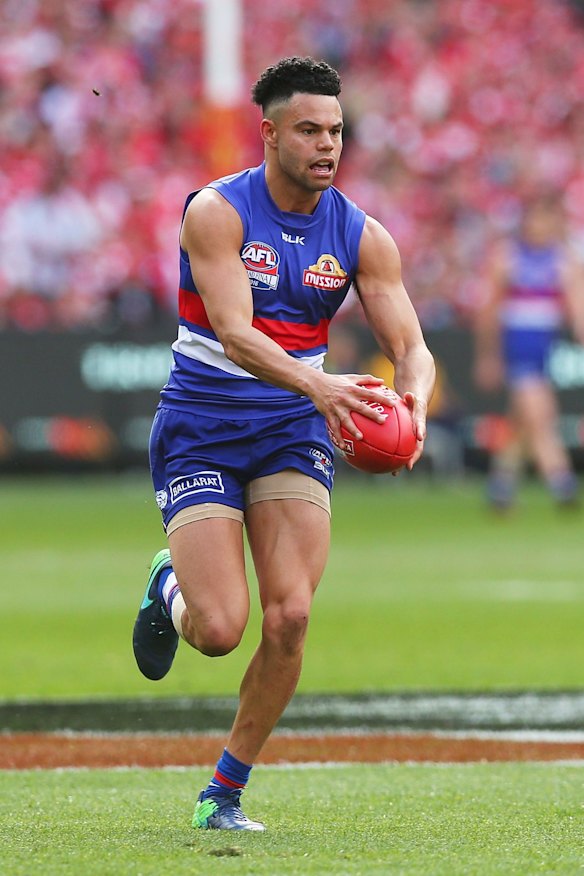  Jason Johannisen of the Western Bulldogs runs with the ball during the 2016 AFL Grand Final.