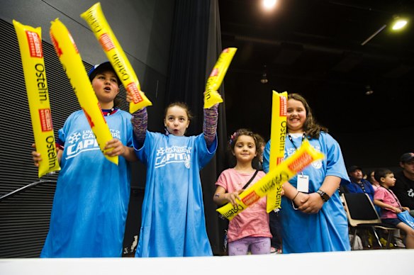 The crowd is excited to see Canberra Capitals. 