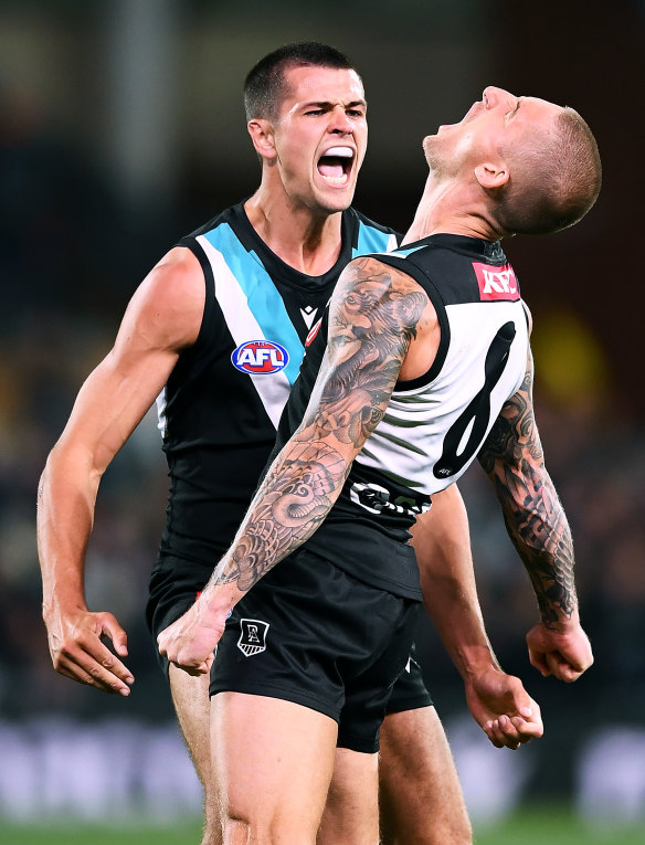 Port Adelaide’s Hamish Hartlett and Ryan Burton.