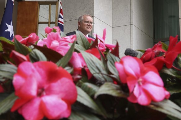 Prime Minister Scott Morrison addresses the media during a press conference at Parliament House in Canberra on Friday. Mr Morrison said the "precautionary actions" were understandable and offered a slim hope that border closures could be eased by Christmas.