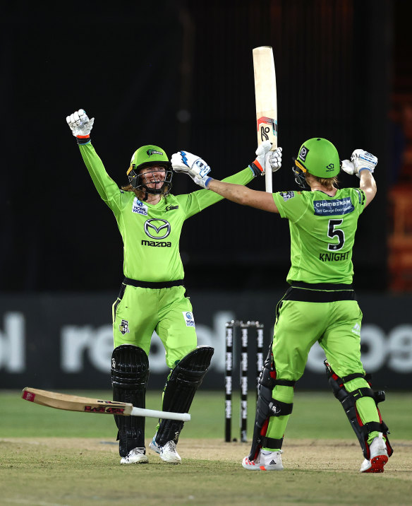 Thunder captain Rachael Haynes celebrates with teammate Heather Knight after winning the BBL Final in 2020.