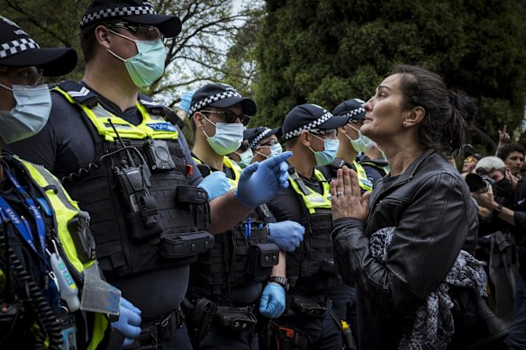 Police clash with protesters at the Shrine.