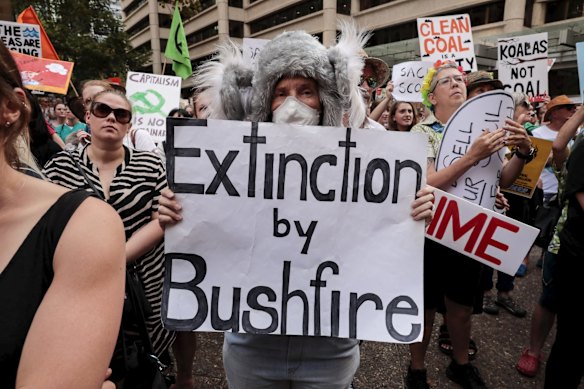 Thousands gather at Town Hall in Sydney CBD to demand action on climate change.