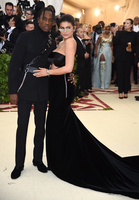Kylie Jenner and Travis Scott attend The Metropolitan Museum of Art's Costume Institute benefit gala celebrating the opening of the Heavenly Bodies: Fashion and the Catholic Imagination exhibition on Monday, May 7, 2018, in New York. 