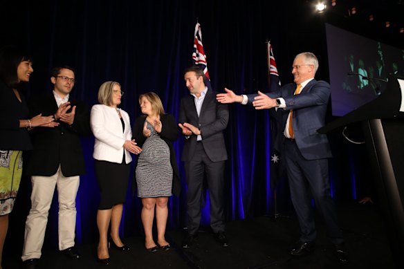 Prime Minister Malcolm Turnbull and his wife Lucy with their children Alex and Daisy and their partners at the Liberal Party election night function at the Sofitel in Sydney.