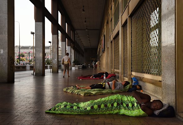 Refugees sleep on the street near the Milan Central Train Station. Some refugees have been taken to reception centres but others will avoid the reception centres and move onto a another country as soon as possible.