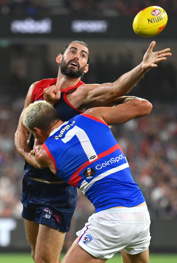 Brodie Grundy of the Demons and Rory Lobb of the Bulldogs compete in the ruck during round one.  