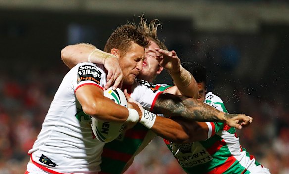 Five from five: Dragons forward Tariq Sims braces for contact.