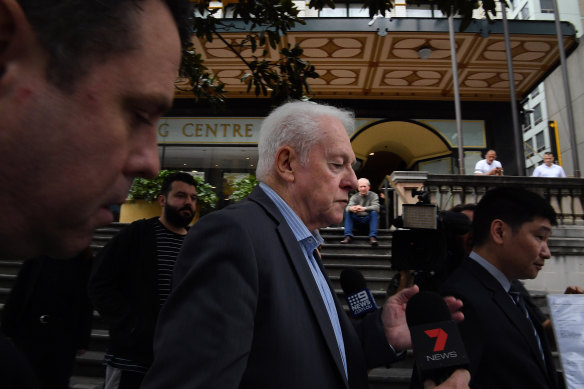 John Killick leaves court on Tuesday after his fraud charges were dismissed.