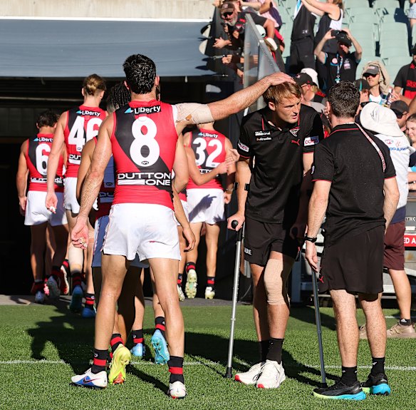 Brayden Fiorini consoles Mason Redman, who suffered an injury on Sunday.
